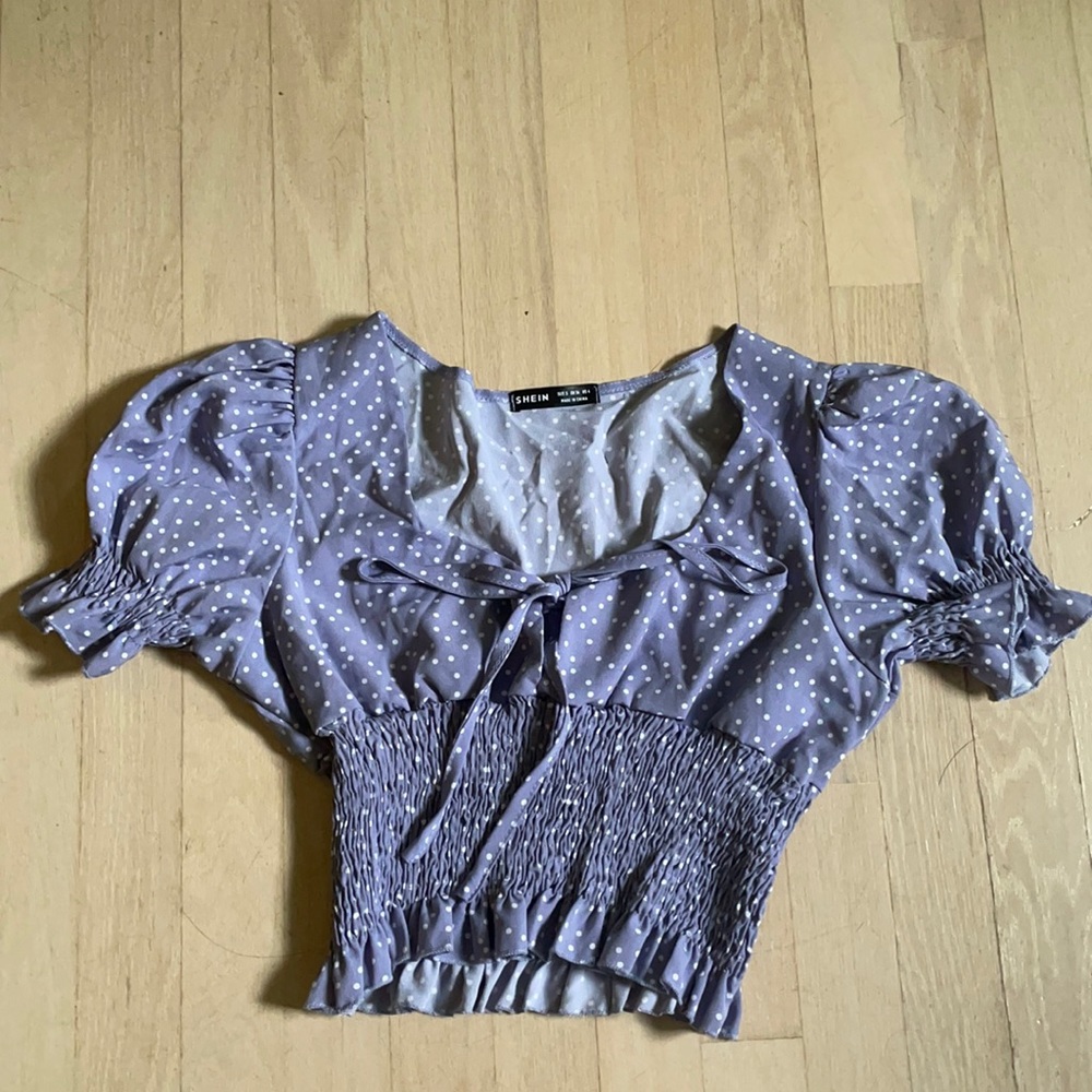 Polkadot puff sleeve top with a front tie